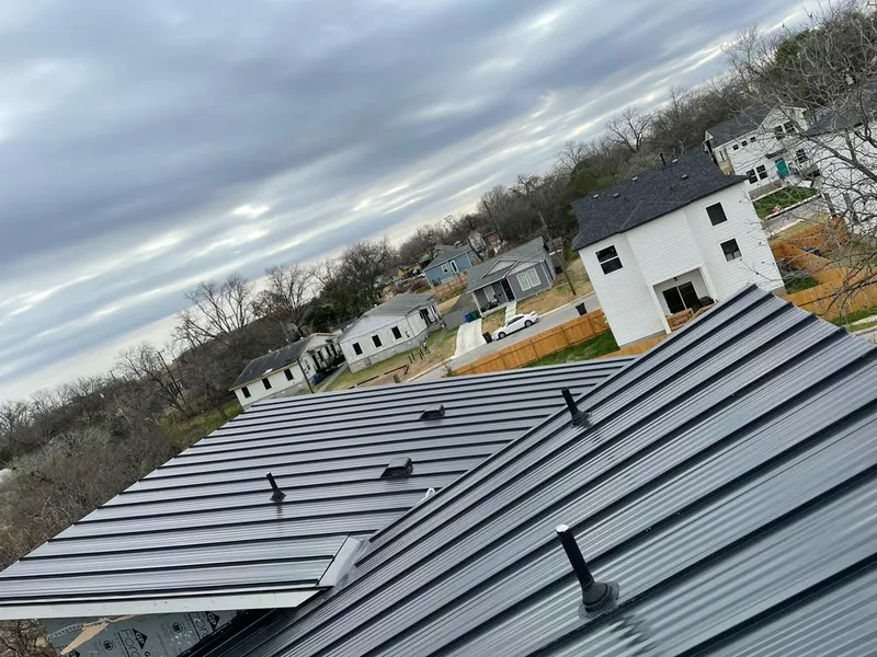 Standing seam metal roof panels with vents for Skylight Repair in Dryden